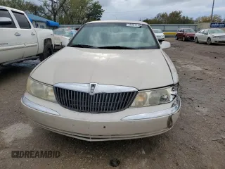 2000 Lincoln Continental with VIN 1LNHM97V3YY822233, listed as a Copart auction lot 78951144 with 226,132 mi miles and Salvage Title. Bid and sale history available at carsss.com. Image 5.