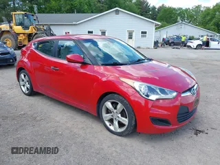 2012 Hyundai Veloster w/Gray Int z VIN KMHTC6AD7CU036446, wystawiony jako IAAI lot #42267057 z przebiegiem 110 564 mil mil oraz . Historia ofert i sprzedaży dostępna na DreamBid. Obrazek 1.