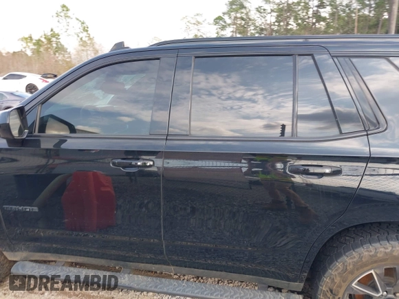 2021 Chevrolet Tahoe Z71 with VIN 1GNSKPKD8MR122190, listed as a IAAI auction lot 41587419 with 106,828 mi miles and . Bid and sale history available at DreamBid. Image 14.