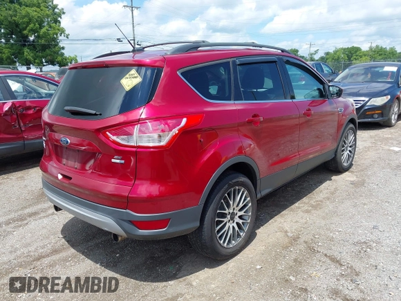 2013 Ford Escape SE with VIN 1FMCU9GX8DUB80346, listed as a IAAI auction lot 42789409 with 157,200 mi miles and . Bid and sale history available at DreamBid. Image 4.
