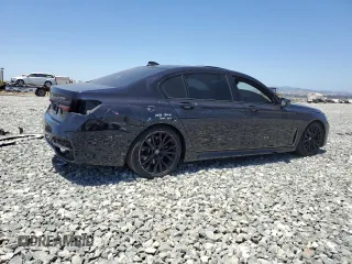 2020 BMW 7 Series 740i z VIN WBA7T2C02LGF96611, wystawiony jako Copart lot #61451935 z przebiegiem 61 185 mil mil oraz Szkoda całkowita • Salvage title. Historia ofert i sprzedaży dostępna na DreamBid. Obrazek 3.