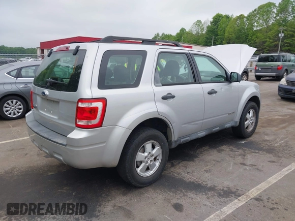 2008 Ford Escape XLS z VIN 1FMCU02Z68KE51829, wystawiony jako IAAI lot #42093869 z przebiegiem 205 151 mil mil oraz . Historia ofert i sprzedaży dostępna na DreamBid. Obrazek 4.