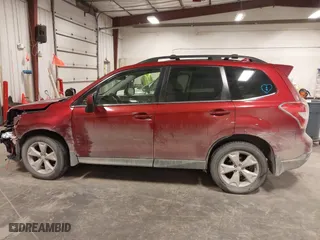 2016 Subaru Forester 2.5i Limited with VIN JF2SJARC5GH505604, listed as a IAAI auction lot 41490919 with 100,312 mi miles. Bid and sale history available at carsss.com. Image 14.