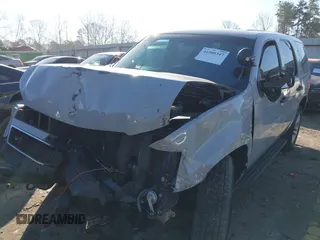 2009 Chevrolet Tahoe Police z VIN 1GNEC03009R163269, wystawiony jako IAAI lot #41500347 z przebiegiem 174 609 mil mil oraz . Historia ofert i sprzedaży dostępna na DreamBid. Obrazek 17.