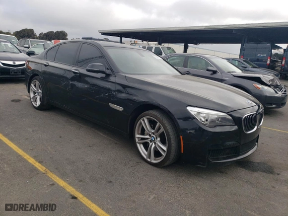 2015 BMW 7 Series 740i with VIN WBAYA6C50FGK16616, listed as a Copart auction lot 74849944 with 125,352 mi miles and Salvage Title. Bid and sale history available at carsss.com. Image 4.