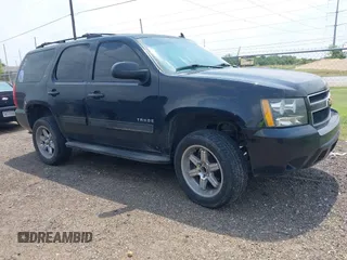 2014 Chevrolet Tahoe LT with VIN 1GNSCBE08ER193058, listed as a IAAI auction lot 42382232 with 228,749 mi miles and . Bid and sale history available at DreamBid. Image 13.