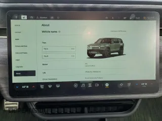 2022 Rivian R1S Launch Edition z VIN 7PDSGABL4NN000393, wystawiony jako Copart lot #44218005 z przebiegiem 26 598 mil mil oraz Szkoda całkowita • Salvage title. Historia ofert i sprzedaży dostępna na DreamBid. Obrazek 9.