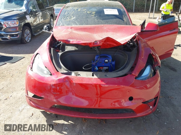 2023 Tesla Model Y Performance with VIN 7SAYGDEF6PF870935, listed as a IAAI auction lot 40718563 with 15,286 mi miles and . Bid and sale history available at DreamBid. Image 6.
