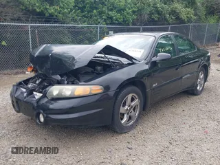 2002 Pontiac Bonneville SLE z VIN 1G2HY54KX24177224, wystawiony jako IAAI lot #42268134 z przebiegiem 107 935 mil mil oraz . Historia ofert i sprzedaży dostępna na DreamBid. Obrazek 19.
