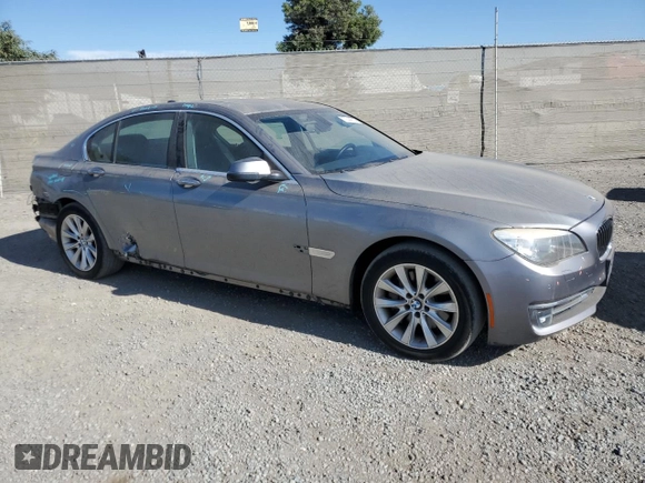 2014 BMW 7 Series 740i with VIN WBAYA6C55ED144487, listed as a Copart auction lot 77044014 with 86,149 mi miles and Salvage Title. Bid and sale history available at carsss.com. Image 4.