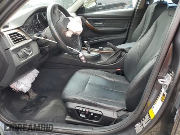 2014 BMW 3 Series 328i xDrive with VIN WBA3B3G52ENR83619, listed as a Copart auction lot 66231105 with 72,409 mi miles and Salvage title. Bid and sale history available at DreamBid. Image 7.