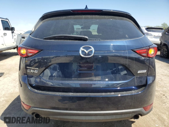 2018 Mazda CX-5 Grand Touring with VIN JM3KFADM7J0377315, listed as a Copart auction lot 53335185 with 68,462 mi miles and Salvage title. Bid and sale history available at DreamBid. Image 6.