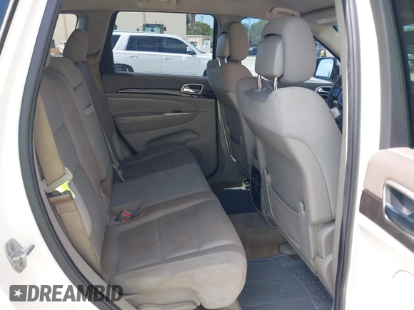 2011 Jeep Grand Cherokee Laredo with VIN 1J4RS4GG0BC573388, listed as a IAAI auction lot 42167064 with 63,363 mi miles and . Bid and sale history available at DreamBid. Image 8.