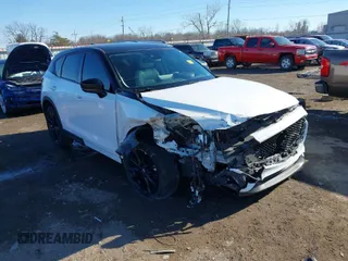 2021 Mazda CX-5 Grand Touring with VIN JM3KFBDM3M0417738, listed as a IAAI auction lot 41308123 with 90,134 mi miles. Bid and sale history available at carsss.com. Image 1.