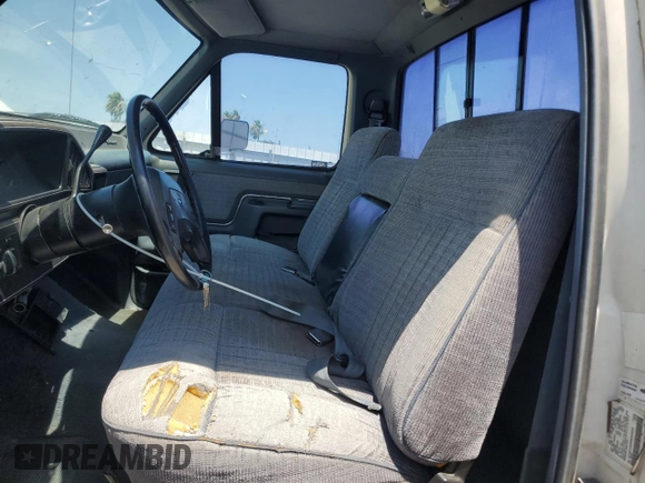 1991 Ford F-150 с VIN 1FTDF15N9MNA83835, выставлен на аукционе Copart как лот 56655785 с пробегом 70 731 миль миль и Списание • Salvage title. История ставок и продаж доступна на DreamBid. Изображение 7.
