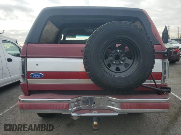 1991 Ford Bronco Custom with VIN 1FMEU15H0MLA44126, listed as a Copart auction lot 82401324 with 79,550 mi miles and Salvage Title. Bid and sale history available at DreamBid. Image 6.