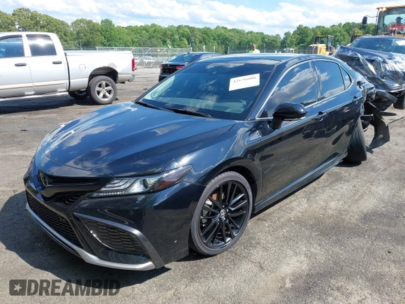 2022 Toyota Camry TRD with VIN 4T1KZ1AK2NU064511, listed as a IAAI auction lot 42176608 with 28,064 mi miles and . Bid and sale history available at DreamBid. Image 17.
