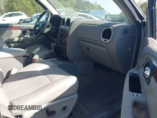 2005 GMC Envoy SLE with VIN 1GKDS13S452306939, listed as a IAAI auction lot 41931667 with 236,955 mi miles and . Bid and sale history available at DreamBid. Image 5.