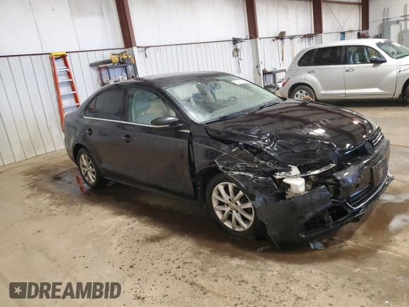 2014 Volkswagen Jetta SE with VIN 3VWD17AJ6EM387167, listed as a Copart auction lot 52251955 with 150,441 mi miles and Salvage title. Bid and sale history available at DreamBid. Image 4.