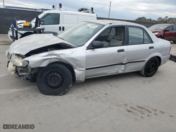 2001 Mazda Protege DX with VIN JM1BJ222310425181, listed as a Copart auction lot 88560255 with 201,942 mi miles and Salvage Title. Bid and sale history available at carsss.com. Image 1.