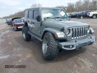 2018 Jeep Wrangler Unlimited Sahara z VIN 1C4HJXEN8JW255135, wystawiony jako IAAI lot #41900292 z przebiegiem 71 028 mil mil oraz . Historia ofert i sprzedaży dostępna na DreamBid. Obrazek 1.