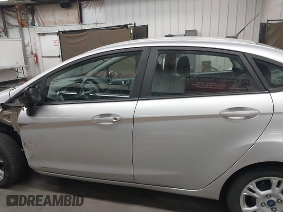 2015 Ford Fiesta SE with VIN 3FADP4BJXFM133631, listed as a IAAI auction lot 41835888 with 51,562 mi miles. Bid and sale history available at carsss.com. Image 15.