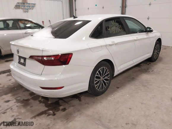 2021 Volkswagen Jetta S with VIN 3VWC57BUXMM069950, listed as a IAAI auction lot 41615386 with 90,827 mi miles. Bid and sale history available at carsss.com. Image 4.