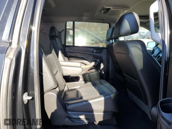 2019 Chevrolet Suburban Premier with VIN 1GNSKJKC7KR146871, listed as a Copart auction lot 43017234 with 96,965 mi miles and Salvage Title. Bid and sale history available at DreamBid. Image 11.