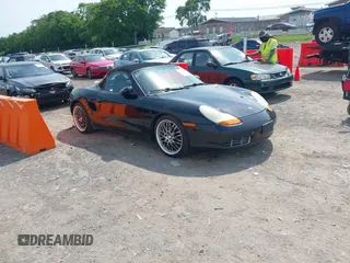 2000 Porsche Boxster z VIN WP0CA2987YU622338, wystawiony jako IAAI lot #42225189 z przebiegiem 162 665 mil mil oraz . Historia ofert i sprzedaży dostępna na DreamBid. Obrazek 1.
