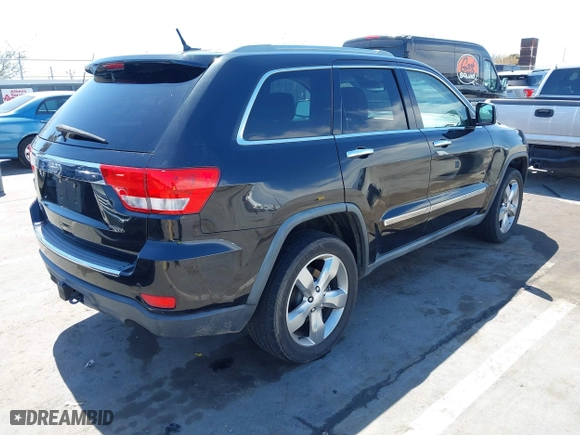 2012 Jeep Grand Cherokee Overland with VIN 1C4RJFCT7CC185602, listed as a IAAI auction lot 42018715 with 91,507 mi miles. Bid and sale history available at carsss.com. Image 4.
