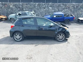 2012 Toyota Yaris L with VIN JTDKTUD35CD529596, listed as a IAAI auction lot 41439354 with 87,493 mi miles. Bid and sale history available at carsss.com. Image 13.