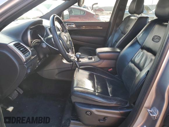 2015 Jeep Grand Cherokee Overland with VIN 1C4RJFCT8FC619014, listed as a Copart auction lot 44304375 with 123,767 mi miles and Salvage Title. Bid and sale history available at carsss.com. Image 7.