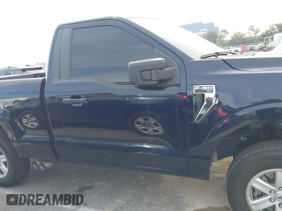 2023 Ford F-150 XL with VIN 1FTMF1C52PKG05729, listed as a IAAI auction lot 41685994 with 12,805 mi miles and . Bid and sale history available at carsss.com. Image 13.
