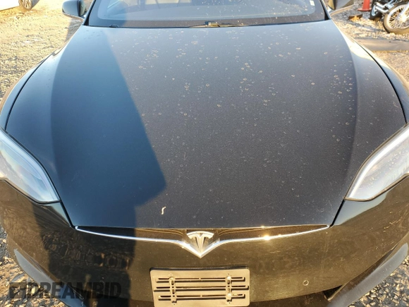 2019 Tesla Model S 75D with VIN 5YJSA1E23KF330239, listed as a Copart auction lot 86737544 with Not provided miles and Salvage title. Bid and sale history available at DreamBid. Image 12.