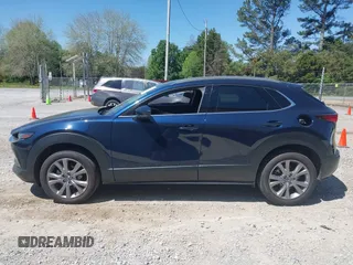 2024 Mazda CX-30 2.5 S Premium Package with VIN 3MVDMBDM7RM654243, listed as a IAAI auction lot 42044783 with 27,936 mi miles. Bid and sale history available at carsss.com. Image 14.
