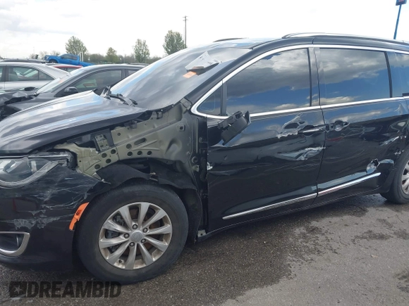 2018 Chrysler Pacifica Touring L with VIN 2C4RC1BG9JR120790, listed as a IAAI auction lot 41998460 with 124,146 mi miles and . Bid and sale history available at DreamBid. Image 6.