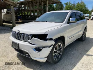 2017 Jeep Grand Cherokee Overland with VIN 1C4RJFCG4HC684559, listed as a Copart auction lot 58276055 with 179,902 mi miles and Salvage title. Bid and sale history available at DreamBid. Image 1.