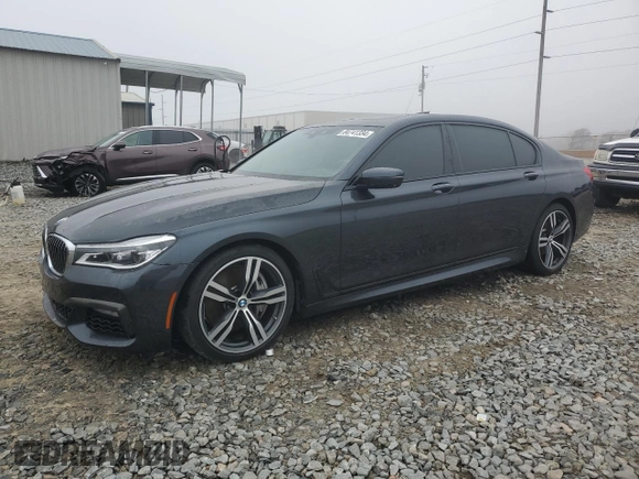 2019 BMW 7 Series 750i with VIN WBA7F0C54KGM25281, listed as a Copart auction lot 84741334 with 76,472 mi miles and Salvage Title. Bid and sale history available at carsss.com. Image 1.