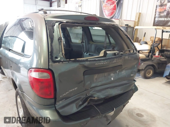 2003 Dodge Caravan SE with VIN 1D4GP24313B191319, listed as a IAAI auction lot 41398477 with 220,083 mi miles. Bid and sale history available at carsss.com. Image 6.