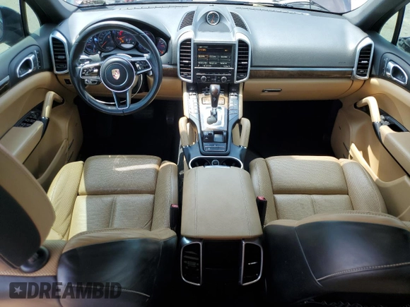 2016 Porsche Cayenne with VIN WP1AA2A24GKA14980, listed as a Copart auction lot 63139115 with 84,671 mi miles and Salvage title. Bid and sale history available at DreamBid. Image 8.