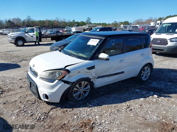2012 Kia Soul + with VIN KNDJT2A64C7470988, listed as a IAAI auction lot 41082059 with 124,592 mi miles. Bid and sale history available at carsss.com. Image 17.