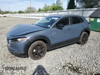 2024 Mazda CX-30 S Carbon Edition z VIN 3MVDMBCM5RM679031, wystawiony jako Copart lot #54966325 z przebiegiem 7 899 mil mil oraz Szkoda całkowita • Salvage title. Historia ofert i sprzedaży dostępna na DreamBid. Obrazek 1.
