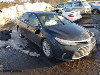 2016 Toyota Avalon Limited with VIN 4T1BK1EB5GU196535, listed as a IAAI auction lot 41670438 with 126,767 mi miles. Bid and sale history available at carsss.com. Image 1.