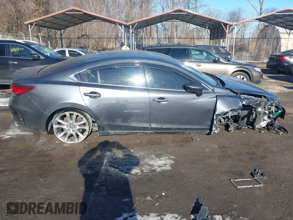 2014 Mazda 6 i Grand Touring with VIN JM1GJ1W67E1137886, listed as a IAAI auction lot 41405112 with 159,879 mi miles and . Bid and sale history available at DreamBid. Image 13.