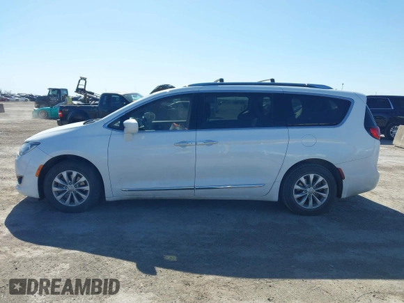 2018 Chrysler Pacifica Touring L with VIN 2C4RC1BG1JR119682, listed as a IAAI auction lot 41762362 with 167,380 mi miles and . Bid and sale history available at DreamBid. Image 14.
