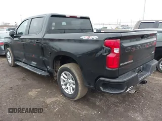 2023 Chevrolet Silverado 1500 RST with VIN 1GCUDEEL1PZ168810, listed as a IAAI auction lot 41458921 with 20,877 mi miles and . Bid and sale history available at DreamBid. Image 3.