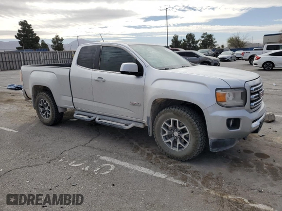2015 GMC Canyon 4WD SLE with VIN 1GTH6BE34F1237917, listed as a Copart auction lot 47091685 with 173,063 mi miles and Salvage Title. Bid and sale history available at carsss.com. Image 4.