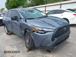 2023 Toyota Corolla Cross L with VIN 7MUAAAAG9PV047205, listed as a IAAI auction lot 41898077 with 29,184 mi miles and . Bid and sale history available at DreamBid. Image 6.