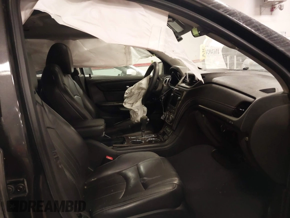 2015 Chevrolet Traverse LTZ with VIN 1GNKVJKD8FJ360899, listed as a IAAI auction lot 41634924 with 165,835 mi miles and . Bid and sale history available at DreamBid. Image 5.