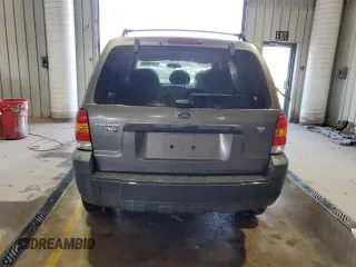 2006 Ford Escape XLT with VIN 1FMYU93136KB47339, listed as a Copart auction lot 77029434 with 76,101 mi miles and Salvage Title. Bid and sale history available at carsss.com. Image 6.